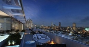 The hotel's rooftop bar offers a gorgeous view of the city.